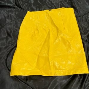 Yellow faux leather material skirt